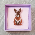 Decorative vintage pattern brown rabbit acrylic brooch with floral pattern and secure roll pin fastening, presented in a lilac gift box.