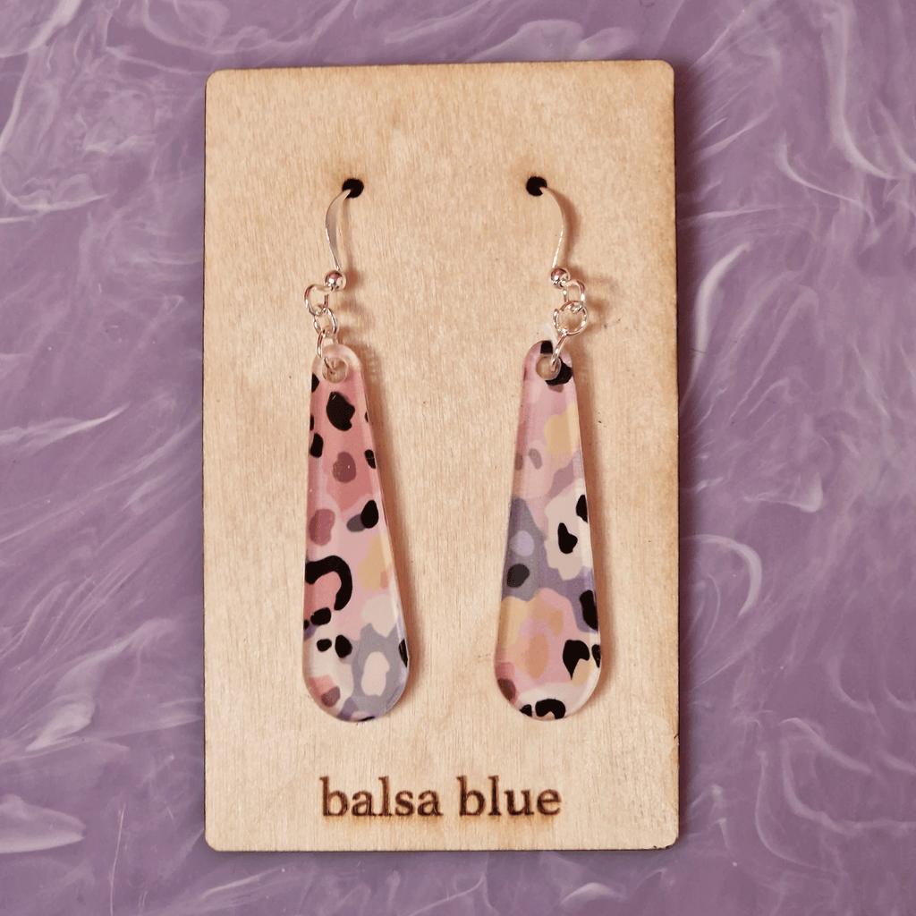 Pale pink, purple, lilac, beige and black printed acrylic leopard print drop earrings with silver plated hook